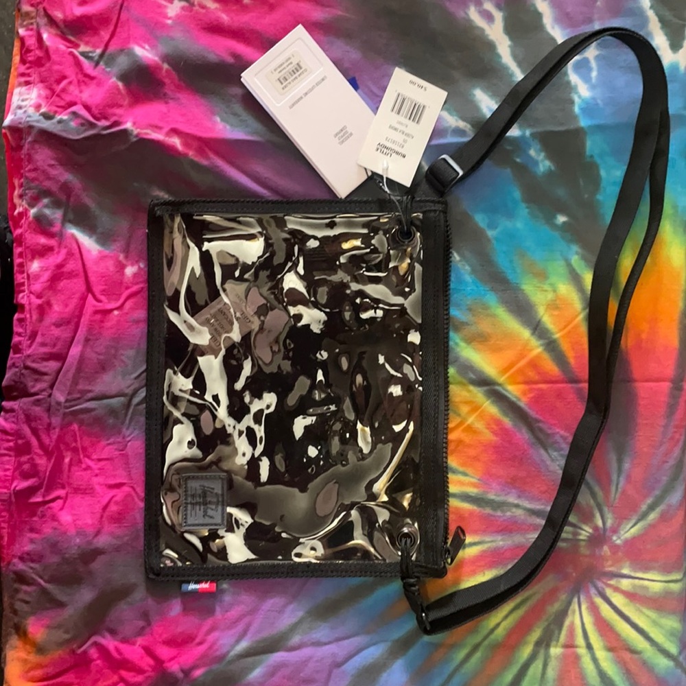 Brand new hershel tinted clear bag
